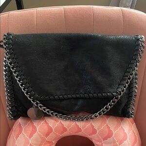 Vegan whipstitch convertible clutch to crossbody bag with chain details